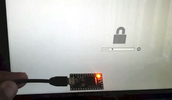 Teensy 3.2 attached to a 2012 MacBook Pro showing the EFI password prompt with a four-digit PIN entry field
